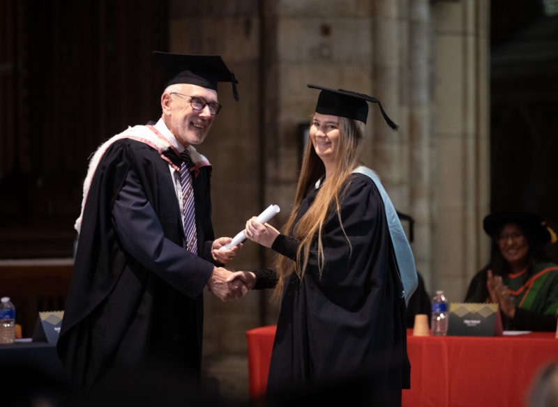 Graduates collecting their award from Chair of Governors at the Heart of Yorkshire Education Group Andrew Mc Connell OBE