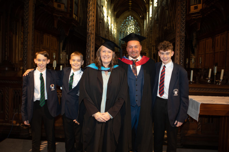 Katie Thompson and Craig Thompson graduating alongside their children