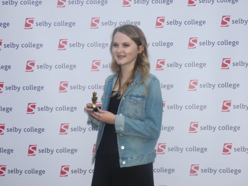 Beth Wilson pictured with her Academic Achievement Award