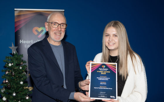 Andrew Mc Connell OBE presenting Chloe Petch with the Most Improved Student at GCSE Mathematics Award